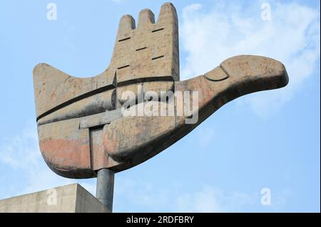 INDIA, Chandigarh, the master plan of the city divided in sectors was prepared by swiss-french architect Le Corbusier in the 1950` , Sector 1 Capitol complex, metal and concrete monument The Open Hand designed by Le Corbusier, symbolizes 'the hand to give and the hand to take; peace and prosperity, and the unity of mankind' Stock Photo